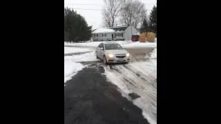 Rosa backing out of Mike's driveway