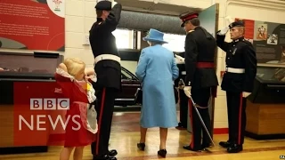 Child hit in face by soldier saluting the Queen - BBC News