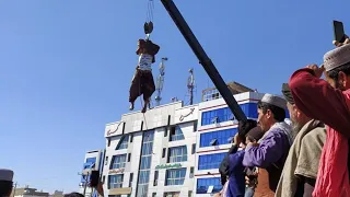 Daily News Egypt |Taliban hang body in public; signal return to past tactics