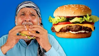 Tribal People Try Cheese Burger For The First Time