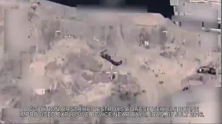 NATO Unclassified: A Coalition Airstrike Destroys a Da’esh VBIED near Bayji, Iraq on July 7, 2016.