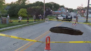 Large hole opens up on Omaha street