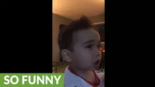 Baby has mind blown by AC unit