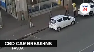 WATCH | 3 suspects break into a woman's car in the Joburg CBD