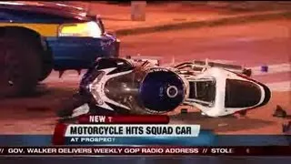 Motorcyclist hits squad car