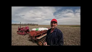 International T6 crawler seeding grass with International 100 Disk Drill