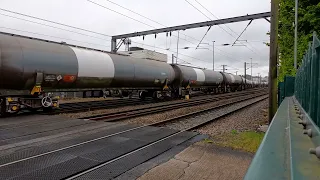 GBRf 66785'John Ellis' passes cremorne lane crossing on the harwich-north walsham tanks on 15/5/24