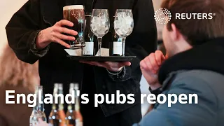 England's pubs reopen in 'major step' to freedom