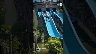 Dad Scales Waterslide to Help His Stuck Daughter