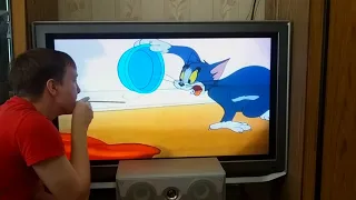 Tom and Jerry the invisible mouse drinking milk