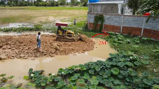 New Project Display Skills Operator​ Bulldozer Cutting Soil In Water For Making Road Parallel Fence