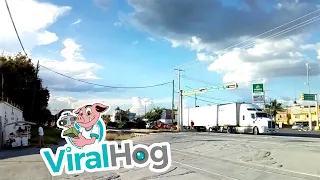 Truck Crosses Train Track at the Worst Possible Time || ViralHog