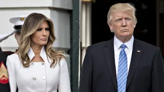 The Real Reason Melania Trump Swatted Donald Trump's Hand Away