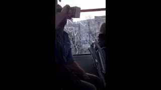 Jake farting behind old man on a tram