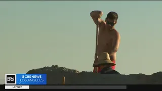 Long Beach build protective berms as impending tropical storm approaches