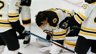 Rask leaves game after taking Josi slapper off mask