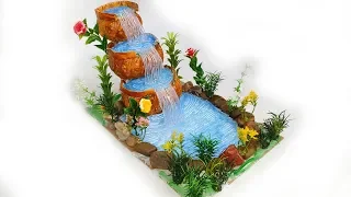 Triple Waterfall from hot glue gun and stones. Showpiece for home decoration.
