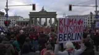 German climate activists rally at Brandenburg Gate