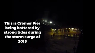 Waves batter Cromer Pier during Storm Surge