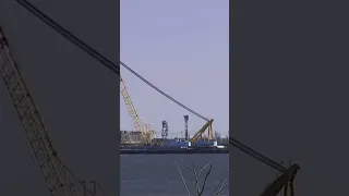 Crews begin removing first pieces of collapsed Baltimore bridge