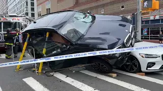 BMW rolls over onto firefighter's leg during rescue in NYC