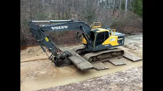 Excavator Venturing Out Onto Quicksand