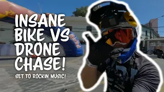 Urban downhill mountain biking drone footage - Insane fpv vs bike chase!
