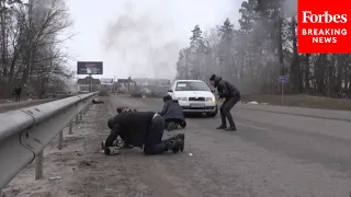 Civilians Attempt To Escape Battles Between Russian, Ukrainian Soldiers