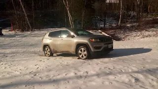 Jeep Compass 4x4 struggling on a snowy slope