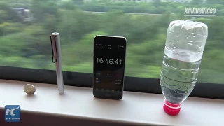 Watch how long coin can balance on high-speed train traveling at 350 kph