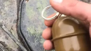 Ukrainian Soldier Playing-Around With Hand Grenade Over Tank While Russian Troops Stuck Inside