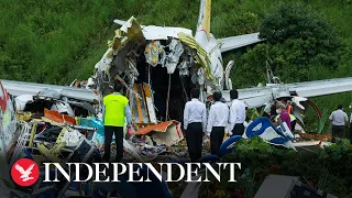 Air India Express plane crash lands and breaks apart