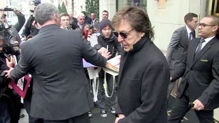 Sir Paul McCartney and wife Nancy Shevell getting out of the Bristol Palace in Paris