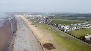 Aerial view of Allonby, Cumbria from the church end. Best viewed in 1080p setting