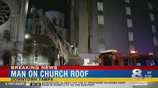 Man on church roof