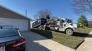 2 Roll Off Garbage Trucks