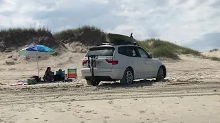 BMW X3 on beach sand