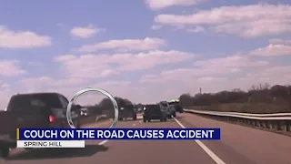 Couch on the road causes accident