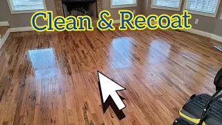 Cleaning hardwood floors with 2 coats of refinisher and the customer was amazed with the results