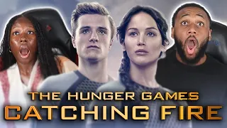 OUR FIRST TIME WATCHING THE HUNGER GAMES: CATCHING FIRE | MOVIE REACTION