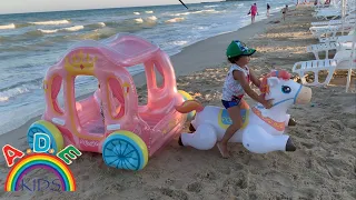 Kids having a fun day on the beach /playing with sand and other toys. #KidsOnTheBeach #SandToys