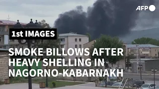 Smoke billows above Nagorno-Karabakh's main city Stepanakert after heavy shelling | AFP