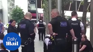 Police at Liverpool One shopping centre where teen was arrested - Daily Mail