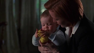 Mulder watches Scully with baby (7x22)