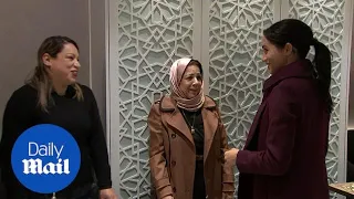 Meghan Markle greets women at the Community Kitchen near Grenfell