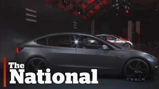 Tesla Unveils New Model 3 Car