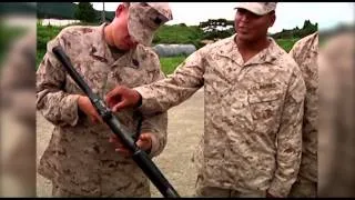 Marines show off equipment to Japanese during Forest Light