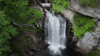 Aerial footage of Looking Glass Falls in North Carolina