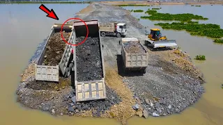 Incredible Nice Operator Bulldozer, Dump Truck Push Moving Stone in Water Building Road on Huge Lake