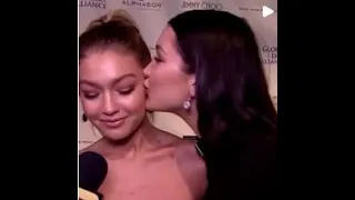 Gigi Hadid started crying in an interview, And Bella hadid give her a kiss to support her.
